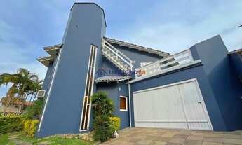 Imagem 2: Casa de esquina com 285m², 3 dormitórios, sendo 1 suites, 4 vagas - amplo pátio