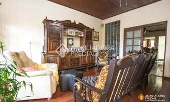 Imagem 3: Casa de 4 quartos com 2 vagas à venda no bairro Partenon em Porto Alegre