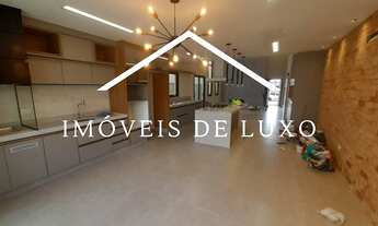 Imagem 1: Casa no Condomínio Saint Paul, térrea para venda, com 3 suítes, escritório. Moderna e otim