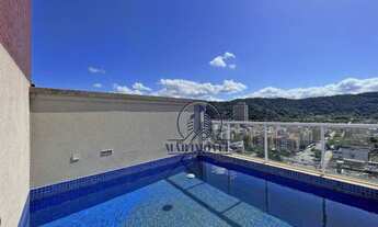 Imagem 2: Cobertura Triplex à Venda na Praia da Enseada com Vista Total para o Mar