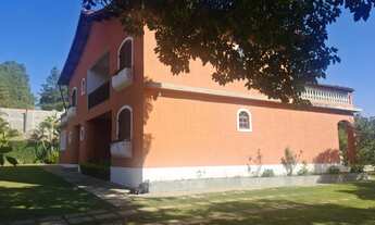 Imagem 6: Casa de condomínio para venda possui 406 metros quadrados com 4 quartos