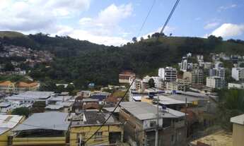 Imagem 2: Casa para venda tem 145 metros quadrados com 4 quartos em Lourdes - Juiz de Fora - MG