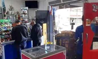 Imagem 2: Investimento, Prédio com moradia e Mercado em pleno funcionamento