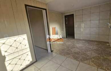 Imagem 4: Página 1 Imóveis anuncia para aluguel, casa de 02 dormitórios, no Bairro Fátima em Canoas