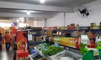 Imagem 3: Investimento, Prédio com moradia e Mercado em pleno funcionamento