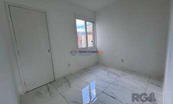 Imagem 5: Apartamento com 54,70 m² de área privativa com dois dormitórios, sala, cozinha e área de s