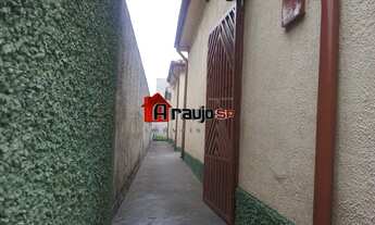 Imagem 6: Casa térrea ampla com entrada lateral e 2 vagas