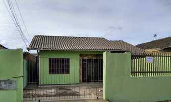 Imagem: Terreno com casa e dois apartamentos