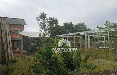 Imagem 4: VENDE SE TERRENO DE ESQUINA COM CASA EM ALVENARIA BAIRRO PIÇARRAS EM GUARATUBA