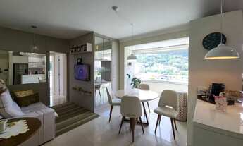 Imagem 7: Apartamento semimobiliado de 2 quartos (1 suíte), sacada com vista para o mar e 2 garagens