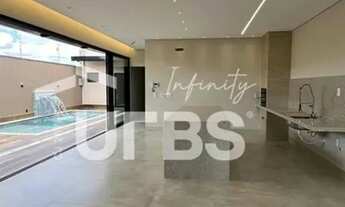 Imagem 6: Casa à venda no Setor Garavelo 3 suítes, área gourmet e piscina aquecida, próxima ao Jard