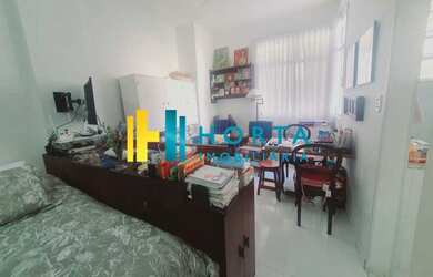 Imagem 7: Conjugado reformado, andar alto, fundos. Uma quadra da praia