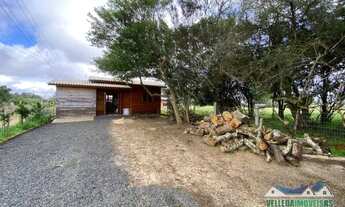 Imagem: Velleda Oferece, Casa próxima do asfalto