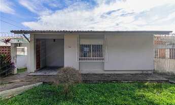 Imagem: Casa de três dormitórios e quatro vagas