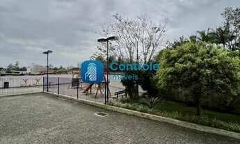 Imagem 3: Apartamento para venda tem 60 metros quadrados com 2 quartos em Praia Comprida - São José