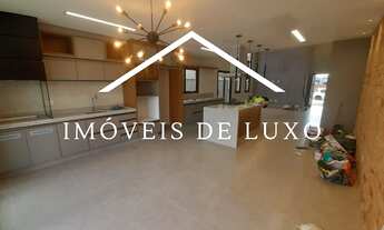 Imagem 3: Casa no Condomínio Saint Paul, térrea para venda, com 3 suítes, escritório. Moderna e otim