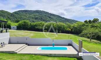 Imagem: Casa em condomínio a venda, 3 suítes 285m²