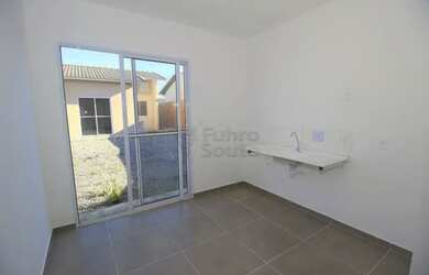 Imagem 4: Casa Aconchegante no Condomínio Altos do Jerivás - Tranquilidade e Conforto no Bairro Três