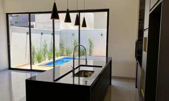 Imagem 2: Casa de condomínio para venda tem 160 metros quadrados com 3 quartos