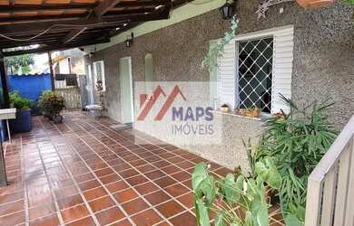 Imagem 7: Casa com cinco quartos, com duas suítes, banheiro social, quatro vagas de garagem no Bairr