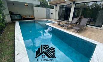 Imagem: 4 suítes, painel solar, gerador, piscina