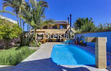 Imagem 2: Aconchegante casa com piscina com aquecimento solar no exclusivo bairro de Cachoeira do Bo