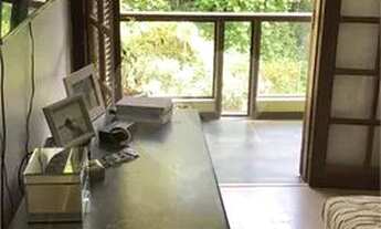 Imagem 3: Casa em condomínio com 02 dormitórios, 01 suíte, garagem para 06 carros, área gourmet, pis