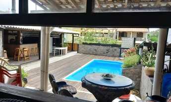 Imagem 2: Casacos piscina na rua da praia no centro de figueira - Arraial do Cabo