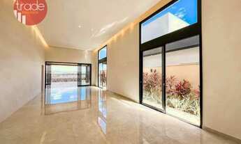 Imagem 3: Casa térrea em condomínio fechado com 03 suítes e piscina borda infinita