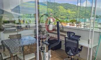 Imagem 1: Cobertura toda decorada com vista privilegiada para o mar