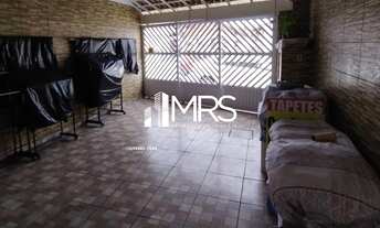 Imagem 2: Casa para venda com 102 metros quadrados com 2 quartos em Caiçara - Praia Grande - SP