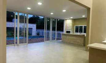 Imagem 4: Casa de condomínio para venda tem 387 metros quadrados com 4 quartos