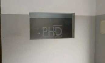 Imagem 4: Salão comercial medindo 60 m², com 1 banheiro e uma copa, sem vaga de garagem