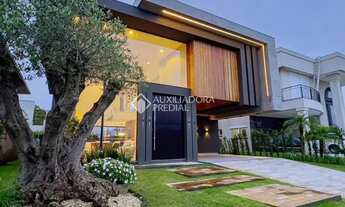 Imagem 2: Casa em Condomínio com 5 dormitórios,5suítes, 2 vagas em Capão da Canoa