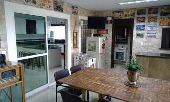 Imagem 7: Casa à venda, Mercês, Curitiba, PR, próximo ao Parque Barigui, com um amplo terreno