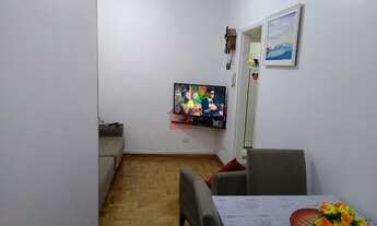 Imagem 2: Um ótimo apartamento com 2 dormitórios, 1 banheiro, com sacada com vista pra rua, sem vaga