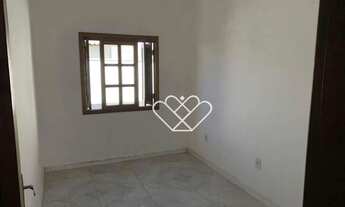 Imagem 7: Encontre o Seu Novo Lar: Casa Aconchegante com Quintal em Bairro Tranquilo