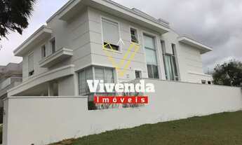 Imagem 2: Viva com conforto e sofisticação em Alphaville: Casa de alto padrão com 4 suítes e 478m²!