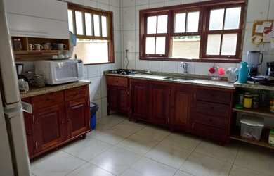 Imagem 6: Casa com cachoeira e mata atlântica