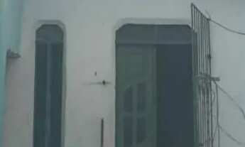 Imagem 2: São duas casas, perto da praça do tomba