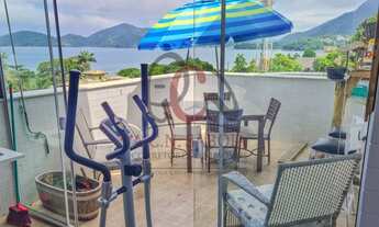 Imagem 4: Cobertura toda decorada com vista privilegiada para o mar