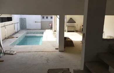 Imagem 3: Casa planejada sob encomenda entrega programada, área gourmet com ilha de granito e armári