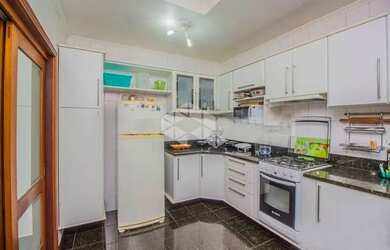 Imagem 6: Casa para venda com 170 metros quadrados com 3 quartos em Auxiliadora - Porto Alegre - RS