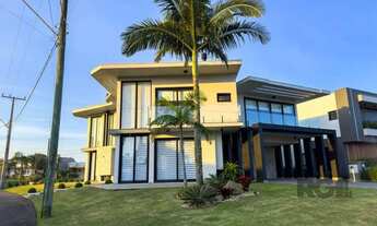 Imagem 4: Casa alto padrão com 5 suítes com closet, churrasqueira, lareira, vagas de garagem, no Con