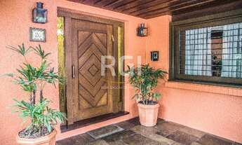 Imagem 4: CASA COM 534M2, 4 DORMITÓRIOS SENDO 2 SUÍTES E 4 VAGAS DE GARAGEM NO BAIRRO TRÊS FIGUEIRAS