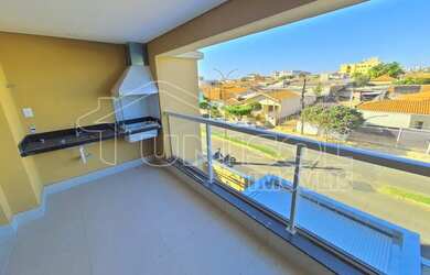 Imagem 2: A Unisol Imóveis aluga apartamento com dois dormitórios sendo duas suítes e sala com sacad