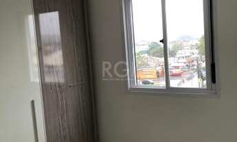 Imagem 6: Apartamento de três dormitórios, suíte e uma vaga de garagem no bairro Cristal em Porto Al