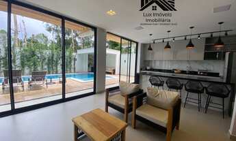 Imagem 2: 4 suítes, painel solar, gerador, piscina e churrasqueira