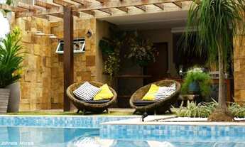 Imagem 3: Casa à venda no Bairro Aruana - 4 suítes, piscina e área gourmet