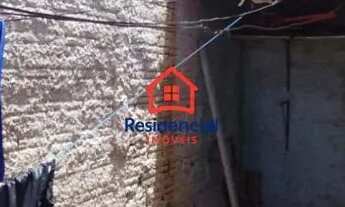 Imagem 3: Casa frente praça